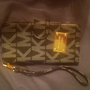 Michael korscard holder / phone holder